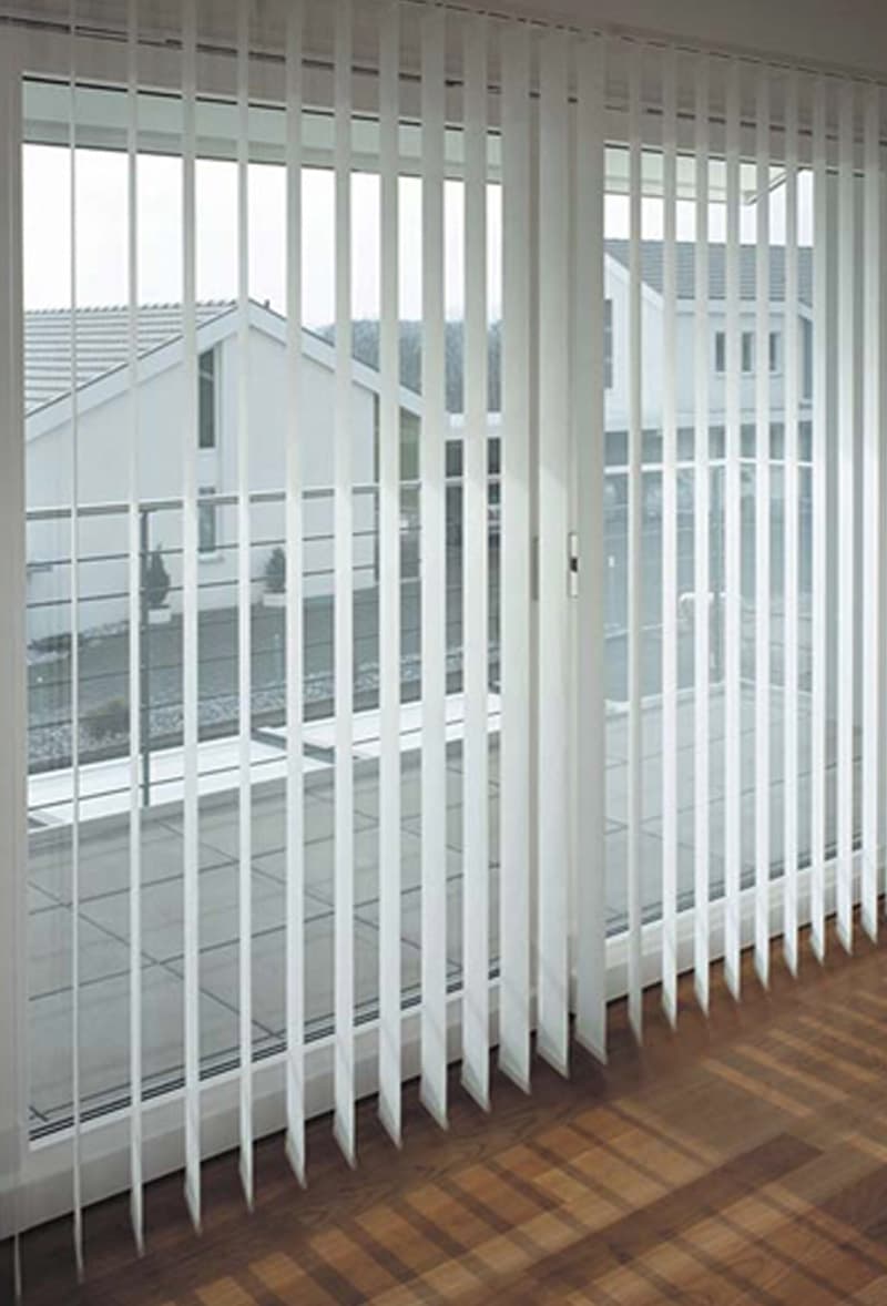 Vertical Blinds for Patio Doors Warrington | Poppy Blinds White vertical blinds fitted to patio doors in a Warrington home by Poppy Blinds